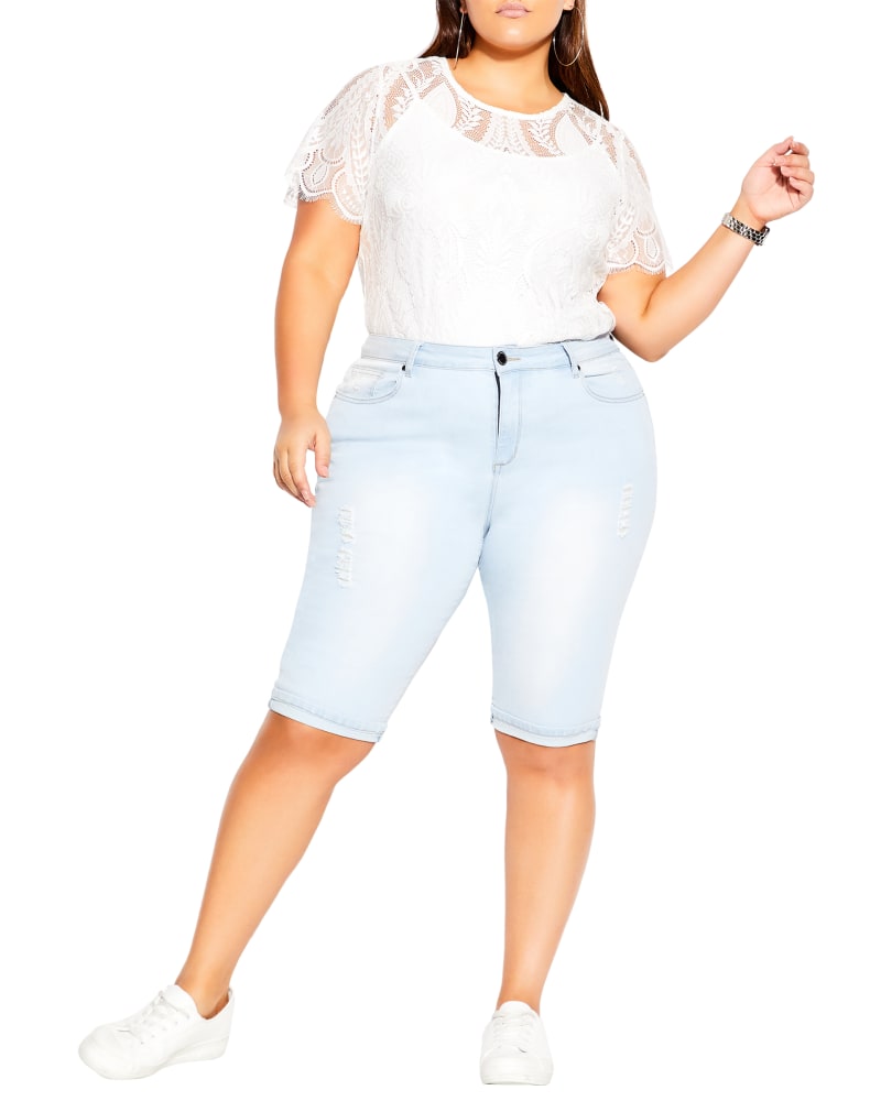 Plus size model wearing Paola Light Wash Ripped Bermuda Short by City Chic | Dia&Co | dia_product_style_image_id:191085